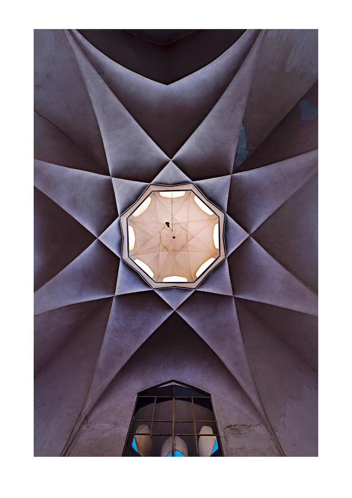 The wonderful geometric star-shaped ceiling of an ancient bazaar. Yazd, Yazd Province, Islamic Republic of Iran.