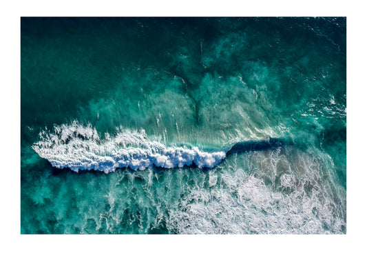 Where the Atlantic Ocean meets the Indian Ocean the seas are forever in motion. Currents mix, nutrients upwell from the depths, and waves relentlessly erode cliffs and beaches. I love doing aerial work from helicopters, I find it far more rewarding than using a remote craft. I guess I just like being there physically as well as creatively.